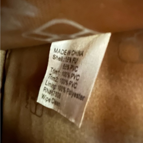 IMAN Global Chic convertible flap handbag with a floral design on the flap - Picture 12 of 14